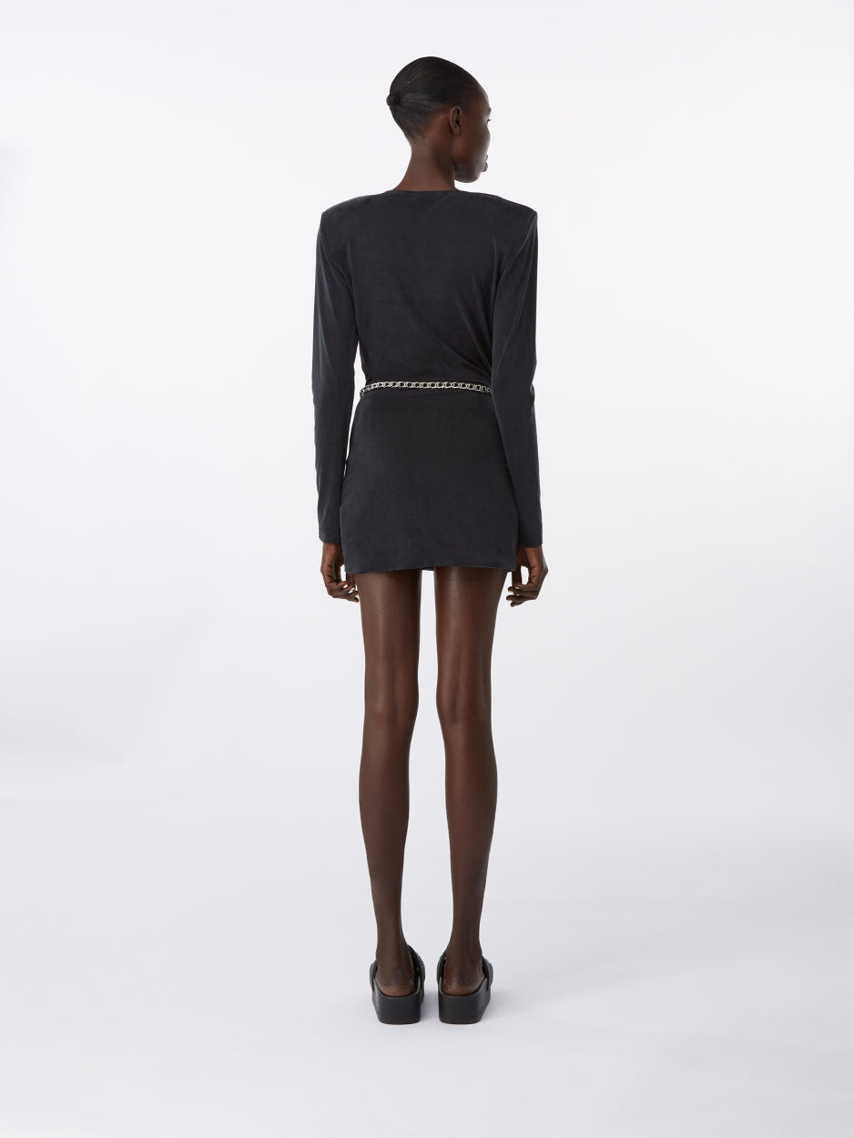 black mini dress with deep v neck long sleeves and metal belt